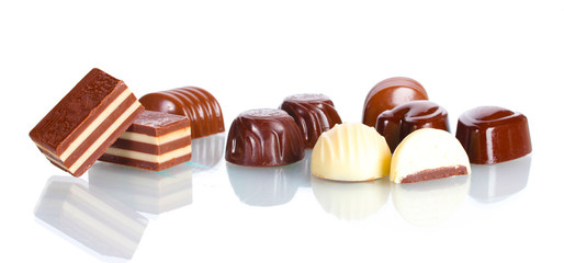 Many different chocolate candy isolated on white