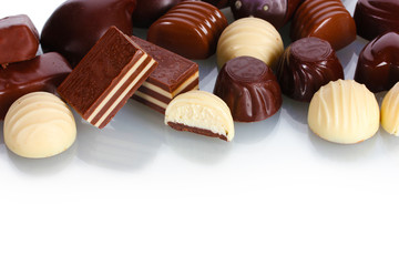 Many different chocolate candy isolated on white