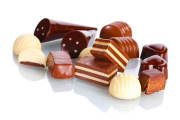 Many different chocolate candy isolated on white
