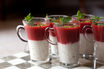 dessert with strawberries and peppermint leaf