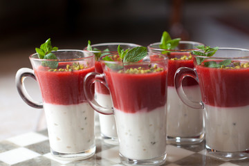 dessert with strawberries and peppermint leaf