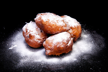 pile of Dutch donut also known as oliebollen