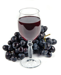 glass with wine and fruit