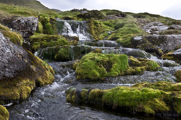 Naklejka na ściany i meble Waterfall on Faroe Islands