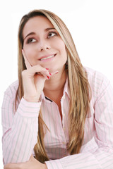 Fototapeta premium Thoughtful latin woman looking up - isolated over white