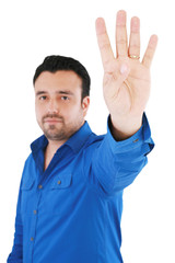 young good looking man with counting fingers against white backg