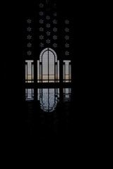 Mosque silhouette and reflection of door and window © klemenr
