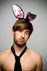 Man wearing bunny ears
