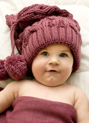 little girl in the lilac hat and scarf