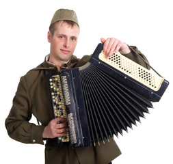 A soldier plays the accordion