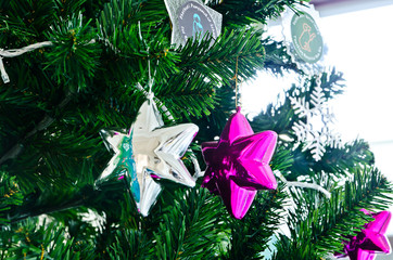 christmas baubles on christmas tree