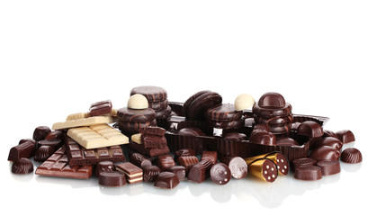 Many different chocolate candy isolated on white