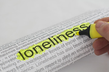 Obraz premium Typed text Loneliness on paper
