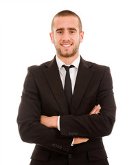 Successful young business man smiling against white background