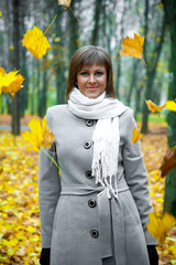 young woman against the autumn landscape