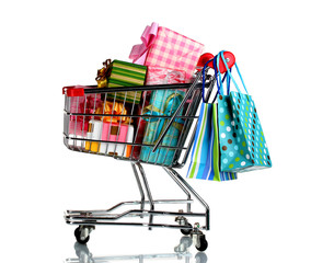 shopping cart with bright gifts and paper bags isolated © Africa Studio