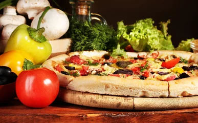 Fotobehang delicious pizza, vegetables and spices © Africa Studio