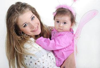 The small girl at mum on hands on a white background with wings