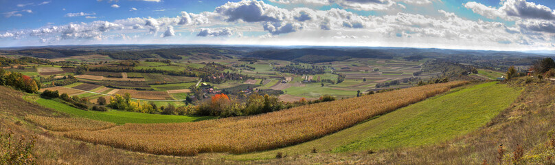 Green valley and golden fields, landscape panorama
