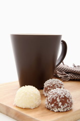 brown cup with coconut balls