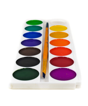 watercolor paints and brushes
