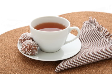 cup of tea with coconut balls