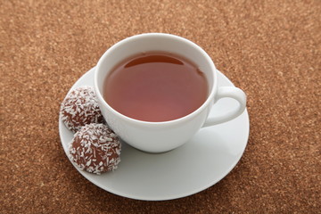 cup of tea with coconut balls