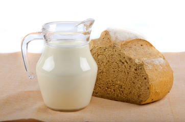 bread and milk in pitcher