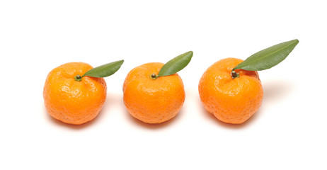 Mandarin with leaves on white