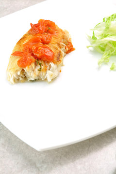 Filetto di pangasio con pomodori freschi e timo
