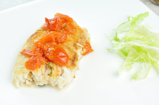 Filetto di pangasio con pomodori freschi e timo