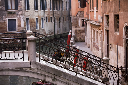Old bridge over venetian canal