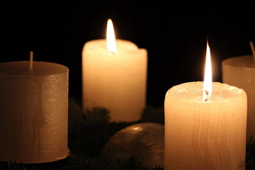 Christmas candles  on black background