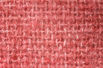 Pink hand-woven blanket in close up / Mohair