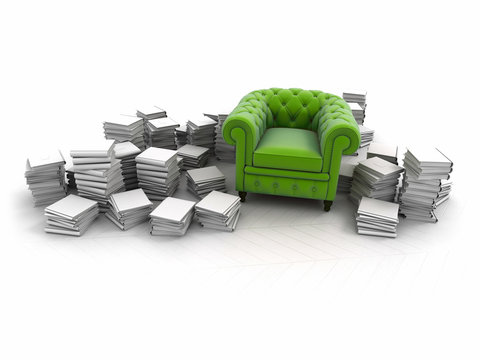 green armchair and books