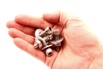 mano umana tiene nel palmo accessori di meccanica