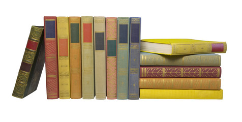 Naklejka premium books in a row, blank labels, free copy space, isolated on white