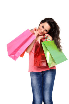 young girl holding shopping bags