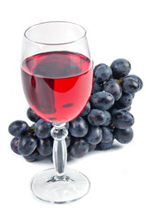 glass with wine and fruit