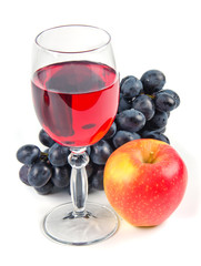 glass with wine and fruit