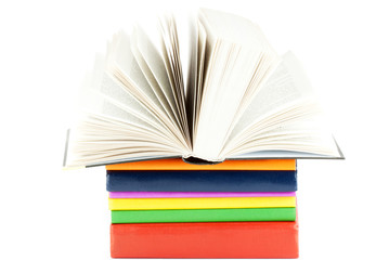 Open book on the stack of the books