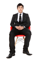 young asian business man sitting