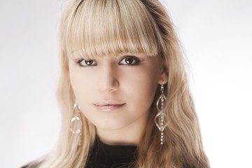 Naklejka premium beautiful young girl over white background