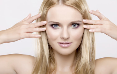 Fototapeta premium Young pretty woman with beautiful blond hairs
