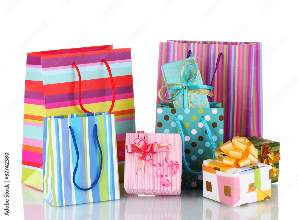 Wall mural bright gift bags and gifts isolated on white