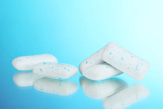 Chewing Gums On Blue Background