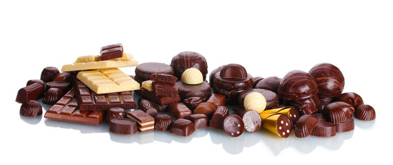 Many different chocolate candy isolated on white