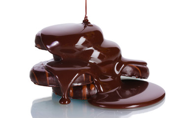 Сhocolate cookies poured chocolate isolated on white