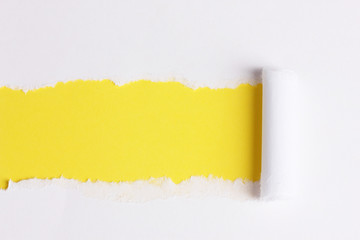 Torn paper  with yellow background
