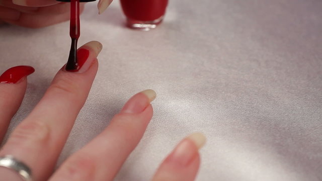 Woman makes manicure. HD